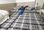 Location vacances Choumen - City Centre Suits 3-4