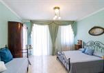 Location vacances  Ville métropolitaine de Catane - Casa delle Zammare Fronte mare centro storico-1