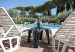 Location vacances Passignano sul Trasimeno - Guesthost - Dolce Far Niente Apartment with pool & parking-1