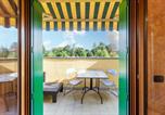 Location vacances  Monte San Giorgio - Lovely Orange House-2