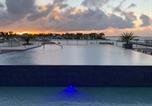 Location vacances  Aruba - Upscale Studio City And Harbor Views Urban Oasis-3