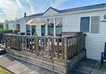 Location vacances  Belgique - Nordsee Glamping Mobilheimchaletstacaravan 2294-2