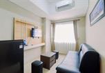 Location vacances Bogor - Homey and Minimalist 1br Royal Sentul Park Apartment By Travelio-4