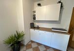 Location vacances  Gare de Rosenheim - Palmen Apartment direkt in Bad Aibling-4