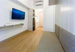 Location vacances Tangerang - Minimalist and Simply Look Studio Tokyo Riverside Pik 2 Apartment By Travelio-2