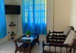 Location vacances  Palm Island ou Ile Prune - Duncan Apartment #1-3