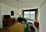Location vacances  West Flanders Province - Beautiful Seaview Apartment for 4-1