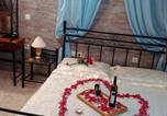 Location vacances Arachova - Irida δωμάτιο με τζάκι οικολογικό και μπαλκόνι-1