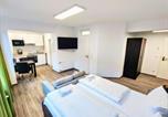 Location vacances Oerlenbach - Boardinghouse - Stadtvilla Budget-1