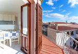 Location vacances  Province de Nuoro - Appartamento in villa 5 posti letto-2