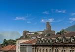 Location vacances Trois châteaux, muraille et remparts du bourg de Bellinzone - Castle View - Happy Rentals-1