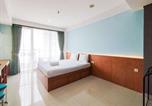 Location vacances Bandung - Serene and Cozy Studio Dago Suites Apartment By Travelio-1