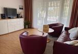 Location vacances Binz - Dünenpark Binz - Komfortplus Ferienwohnung mit 1 Schlafzimmer und Balkon im Obergeschoss 230-2