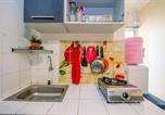Location vacances Bogor - Homey and Compact 2br Cibubur Village Apartment By Travelio-2