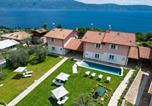 Location vacances  Province de Brescia - Le Casette - Gargna-1