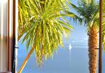 Location vacances  Province de Côme - Apartment The Palm with Garden-4