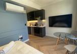 Location vacances Gold of Africa Museum - Chic Studio apartment in De Waterkant-1