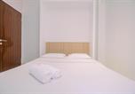Location vacances Bogor - Cozy and Clean 2br at Transpark Cibubur Apartment By Travelio-1