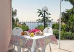 Location vacances  Province de Potenza - Charming House in Maratea, Sea & Mountain Views-4