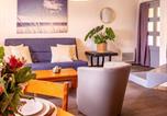 Location vacances Ploemeur - Longère au calme à Larmor-Plage, proche plage et commerces, jardin privatif et parking couvert - Fr-1-349-101-3