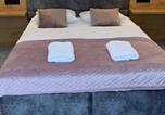 Location vacances  Pologne - Nasze Kamienice Apartament Rodzinny-2