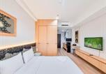 Location vacances Cangkringan - Good and Comfort Stay Studio Patraland Amarta Apartment By Travelio-4