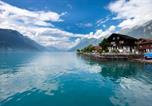 Location vacances Iseltwald - Romantic Lake & Mountain apartment Pure Swissness-1