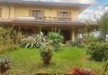 Location vacances  Province de Forlì-Césène - Charming Apartment in San Mauro Pascoli with Garden, 75 m². --1