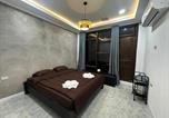 Location vacances Vang Vieng - Sunin Garden Cafe Homestay-1
