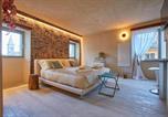Location vacances  Saint-Marin - One Suite-1
