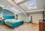 Location vacances  Province de Parme - Casa Mameli in The Heart of City-3