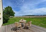 Location vacances Neuenkirchen - Ferienhaus-Remise-direkt-am-Wasser-im-Gut-Grubnow-Ruegen-2