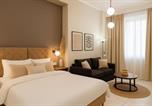 Location vacances  Pella - Black Onyx Comfort Suites - Elegant Stay- City Center Next to Airport Bus-3