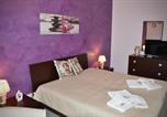 Location vacances  Province de Syracuse - Baazar House-3