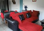 Location vacances Saint-Quentin-la-Poterie - Appartement avec accès jardin-1