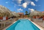 Location vacances  Aruba - Moderne studio Sun dichtbij de zee met zwembad-1