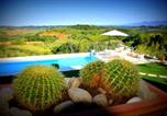 Location vacances  Province de Pise - Fewo Luna mit Garten, Terrasse und einen atemberaubenden Blick-1