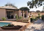 Location vacances Kamanjab - Orpheus Inn & Glamping-1