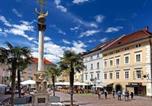 Location vacances Moosburg - Moderne Innenstadtwohnung Klagenfurt-1
