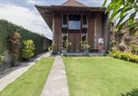 Location vacances Yogyakarta - Reddoorz at Omah Kayu Homestay Yogyakarta-2