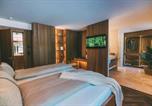 Location vacances Lac Eibsee - Luxurious Grainau Villa Alpine Views, Private Spa Pool-1