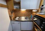 Location vacances  Cantal - Duplex au Lioran avec balcon, proche pistes et commerces - Fr-1-787-25-3