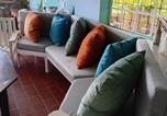 Location vacances  Palm Island ou Ile Prune - Trinity Point Hillside Villa, beach & sunset views-1