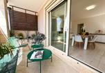 Location vacances  Province de Sassari - Waterfront Alghero Apartment-2