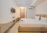 Location vacances Temple de Prambanan - Scenic and Homey Studio Barsa City Apartment By Travelio-1