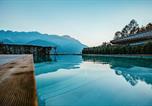 Location vacances Grödig - Luxus Ferienhaus Salzburg Chalet mit Pool, Sauna, Whirlpool, Kamin-1