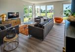 Location vacances  Gare de Schwerin - Hangar 19 Superior Apartment mit Terrasse und Garten H7w2-1