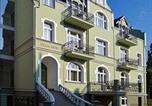 Location vacances  Pologne - Apartamenty Villa Artis-1