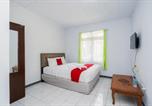 Location vacances Bogor - Reddoorz Syariah near Rsud Cimacan-1