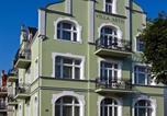 Location vacances  Pologne - Apartamenty Villa Artis-4